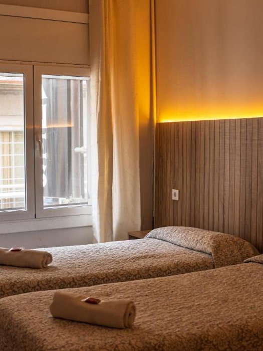 Habitación con camas individuales